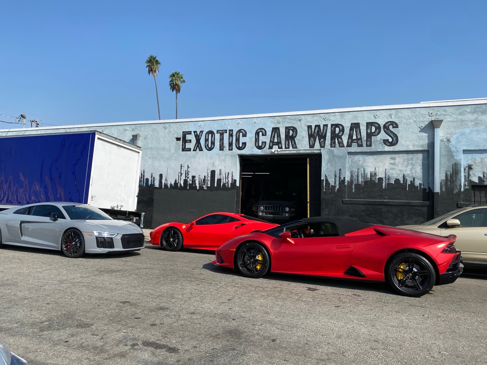 Exotic Car Wraps Los Angeles — Audi R8, Ferrari, and Lamborghini outside our Culver City shop