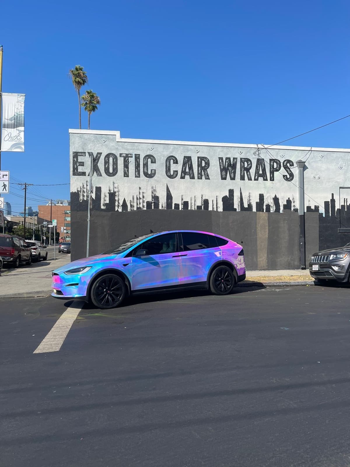Tesla Model X iridescent chameleon holographic wrap — Exotic Car Wraps LA